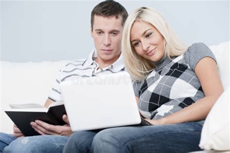 Couple Reading In Bed Stock Image Image Of Enjoyment 12892903