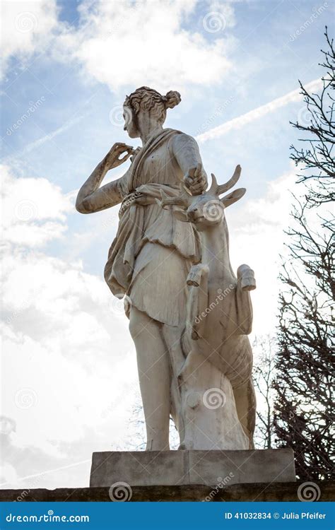 Bird Perched On An Ancient Stone Statue Stock Photo Image Of