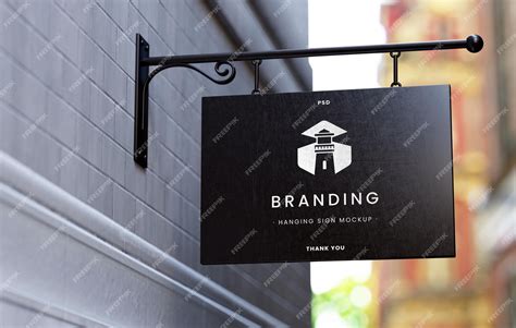 Premium Psd Classic Sign Board Mockup Mounted On A Business Wall