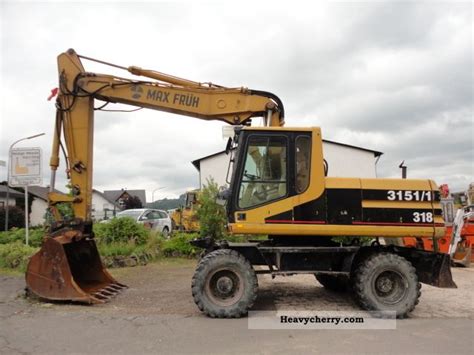 Cat 318 1996 Mobile Digger Construction Equipment Photo And Specs