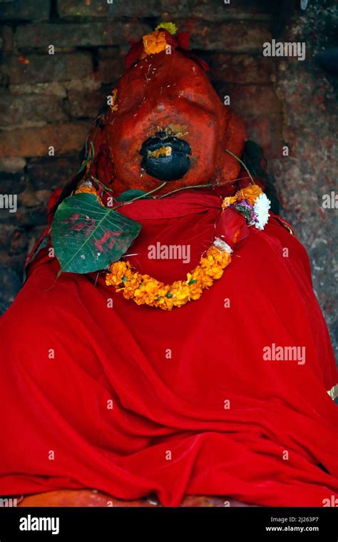 A Statue Of Hanuman The Hindu Monkey God Covered In Dyes Stock Photo