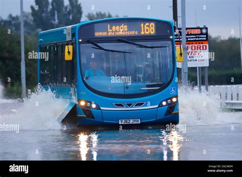 Bus in flood water hi-res stock photography and images - Alamy