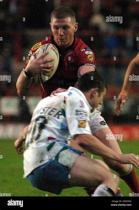 salfords malcolm alker tackled  harlequins steve bannister