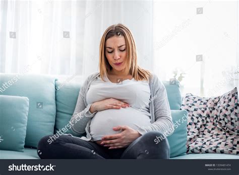 Young Pregnant Woman Suffering Abdominal Pain Stock Photo 1339481474 | Shutterstock