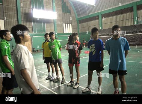 Young badminton players are given instructions during a training session at Jaya Raya badminton ...