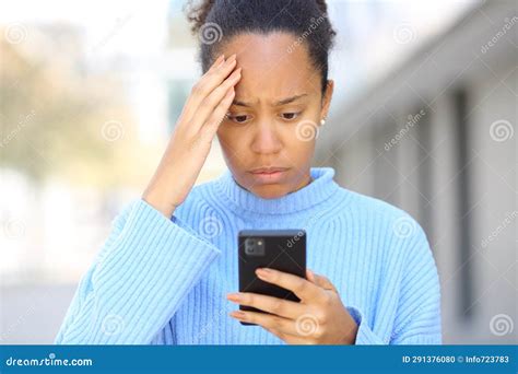 Worried Black Woman Checking Bad News On Phone Stock Photo Image Of