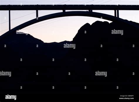 Silhouette of Hoover Dam Bridge and Mountains Stock Photo - Alamy