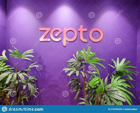 Online Startup Delivery App Zepto Logo on Purple Wall with Plants Below ...