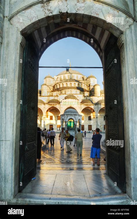 Tourists At The Entrance Of The Blue Mosque Sultan Ahmet Cami