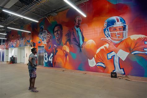 Painting A Broncos Hall Of Fame Wall At The Empower Field On The Team