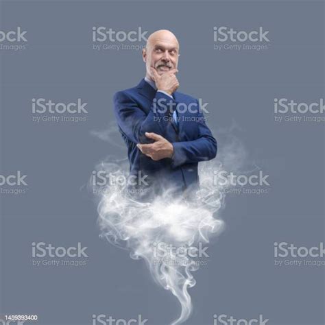 Genie Businessman Appearing With Smoke Stock Photo - Download Image Now ...