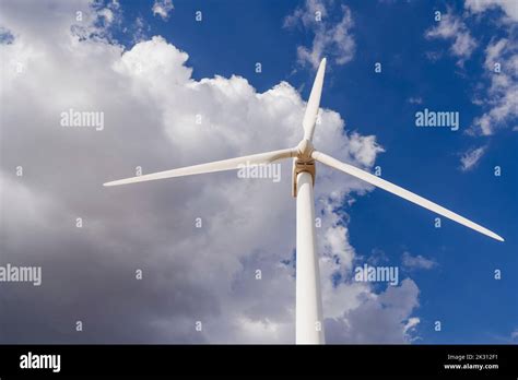 Rotor of wind turbine under clouds Stock Photo - Alamy