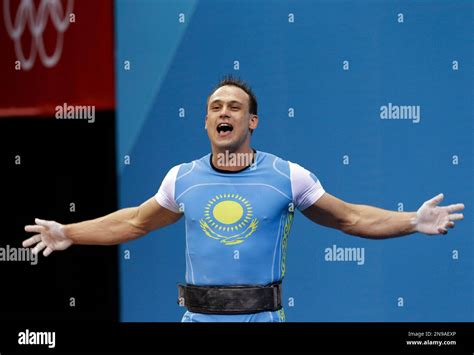 Kazakhstan S Ilya Ilyin Reacts After A World Record Kg Clean And