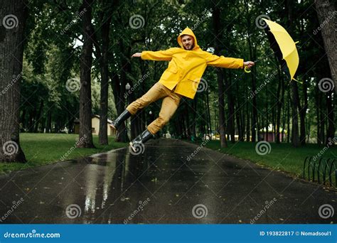 Man Flying With Umbrella In Windy Rainy Day Stock Image Image Of Fall