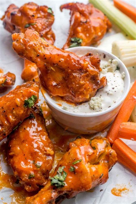 The Best Recipe For Crispy Baked Chicken Wings That Are Dipped Into A