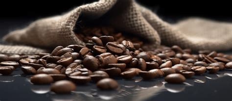 Premium Photo Roasted Coffee Beans Spill Out Of A Burlap Sack On The