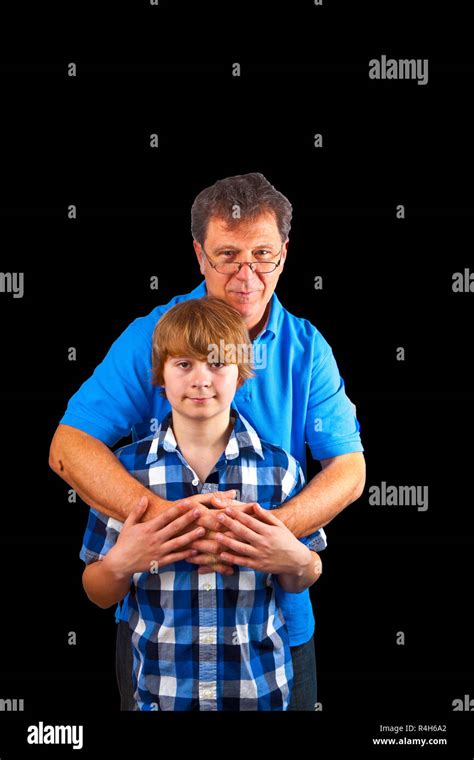 father and son hugging Stock Photo - Alamy