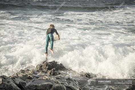 Man Diving Into Water — Surfer Happy Go Lucky Stock Photo 154378094