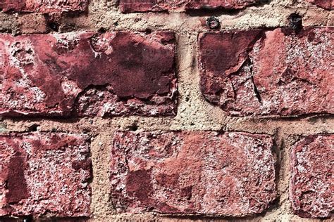 Detailed View At A Colorful Old And Weathered Brick Wall Texture As A Panoramic Background