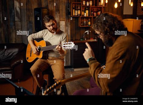 Music Tutor Playing Melody On Electric Guitar Stock Photo Alamy