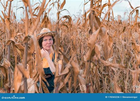 Female Corn Farmer Using Digital Tablet In Cornfield Smart Farming