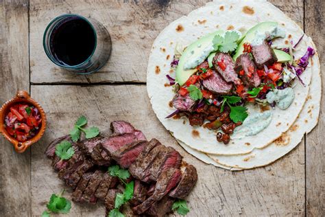 Flat Iron Steak Tacos With Black Bean Mole Pico De Gallo Slaw And Lime Crema