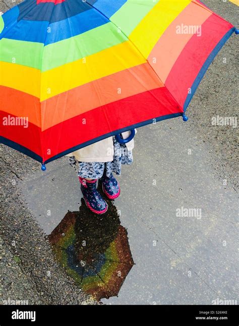 Umbrella Puddle Hi Res Stock Photography And Images Alamy