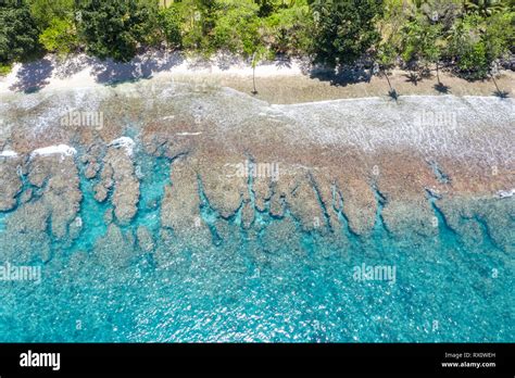 Aerial View Of Reef And Island In Papua New Guinea The Remote