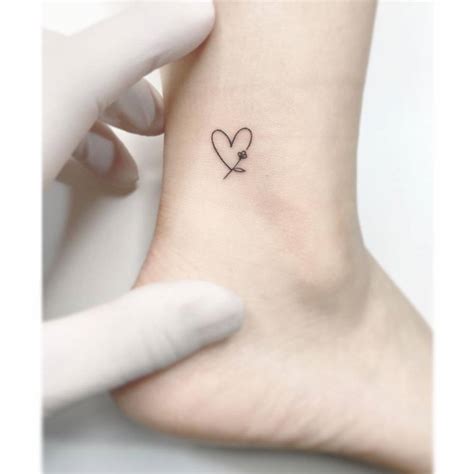 Minimalist Flower Heart Tattoo On The Ankle