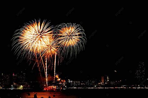 Vibrant Fireworks Illuminating The Night Sky With A Stunning Cityscape Backdrop In Celebration ...