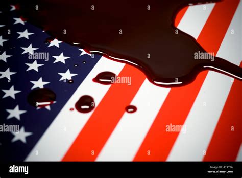 American flag covered in fresh blood Stock Photo - Alamy