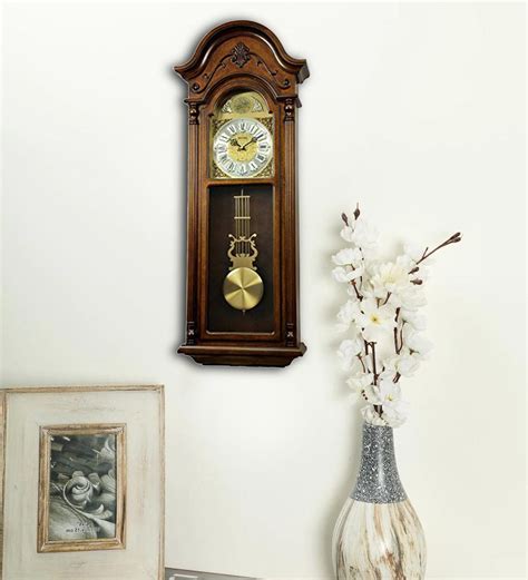 Buy Brown Wooden Pendulum Wall Clock at 23% OFF by Rhythm | Pepperfry