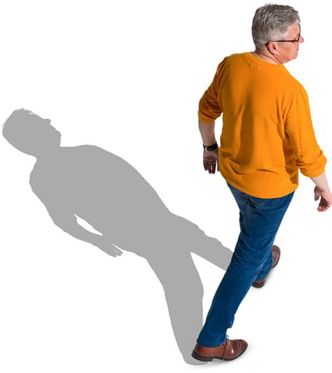 Walking Man In Orange Sweater And Jeans