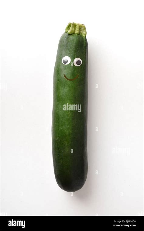 Happy Zucchini With Face On White Isolated Background Fruits And