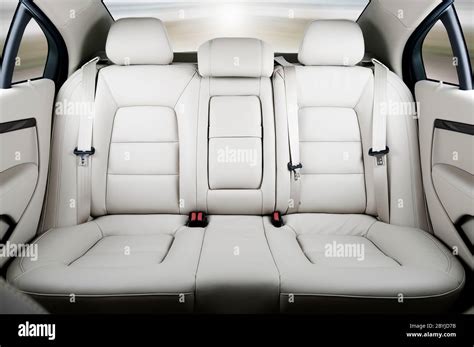 Back passenger seats in modern luxury car, frontal view Stock Photo - Alamy