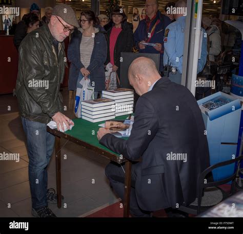 Malmo, Sweden. 25th Nov, 2015. Fredrik Reinfeldt signing his book. Former Swedish Prime Minister ...