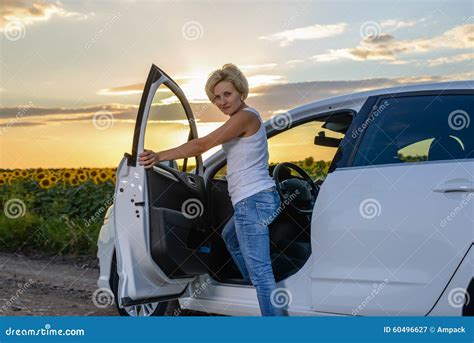 Glum Woman Sitting Waiting For Roadside Assistance Stock Image Image 60496627