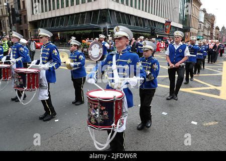 Office Bearers Of The Orange Lodge Marching At The Annual Orange Walk