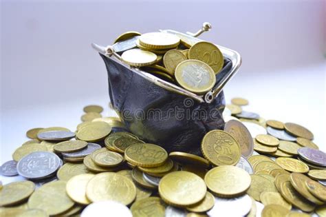 Black wallet full of coins stock photo. Image of money - 119360894