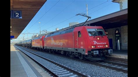 RheinCargo 185 584 185 582 mit Kesselwagenzug durch Bahnhof Bülach