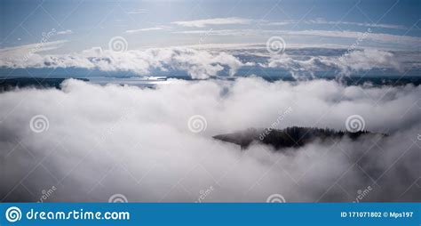 Aerial View Of Morning Fog Hovering Over Sunny Lake Stock Photo Image