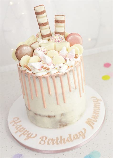 Rose Gold Drip Cake Topped With Treats Cakey Goodness