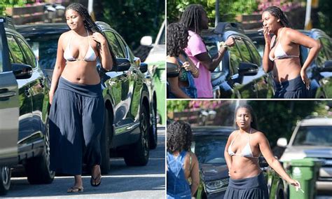 Exclusive Sasha Obama Models Very Skimpy Bikini Top As She Puffs