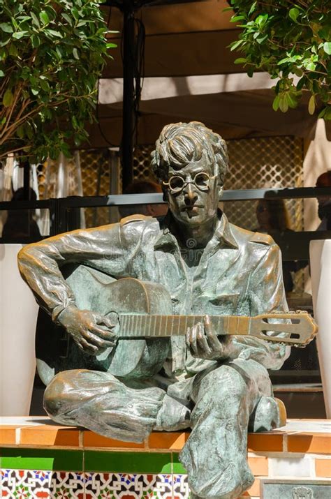 Almeria Spain April A Bronze Statue Of John Lennon Sitting