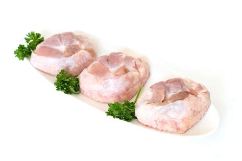 Premium Photo Raw Turkey Chicken Tail On A Plate