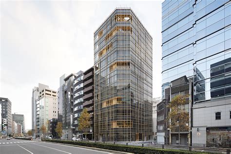 Nendo Wraps The Facade Of Office Building With A Timber Grid In Tokyo