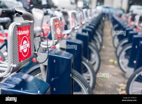 Details of a row of London Santander Hire bikes in a docking station Stock Photo - Alamy