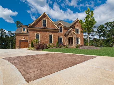 Luxury Model Home Exterior Stone Driveway Stock Image - Image of ...