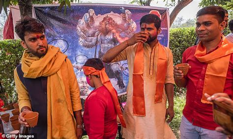 Hundreds Of Hindus Hold Cow Urine Drinking Party In The Belief It Can