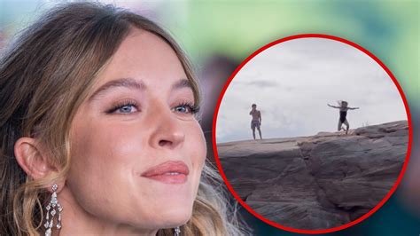 Sydney Sweeney Heats Up Lake Trip With Cliff Jumps Bikini Walks Waterskiing WDC NEWS 6